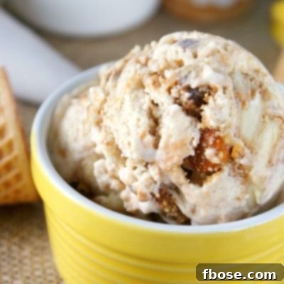 Bowl of Banoffee Ice Cream topped with whipped cream and caramel drizzle