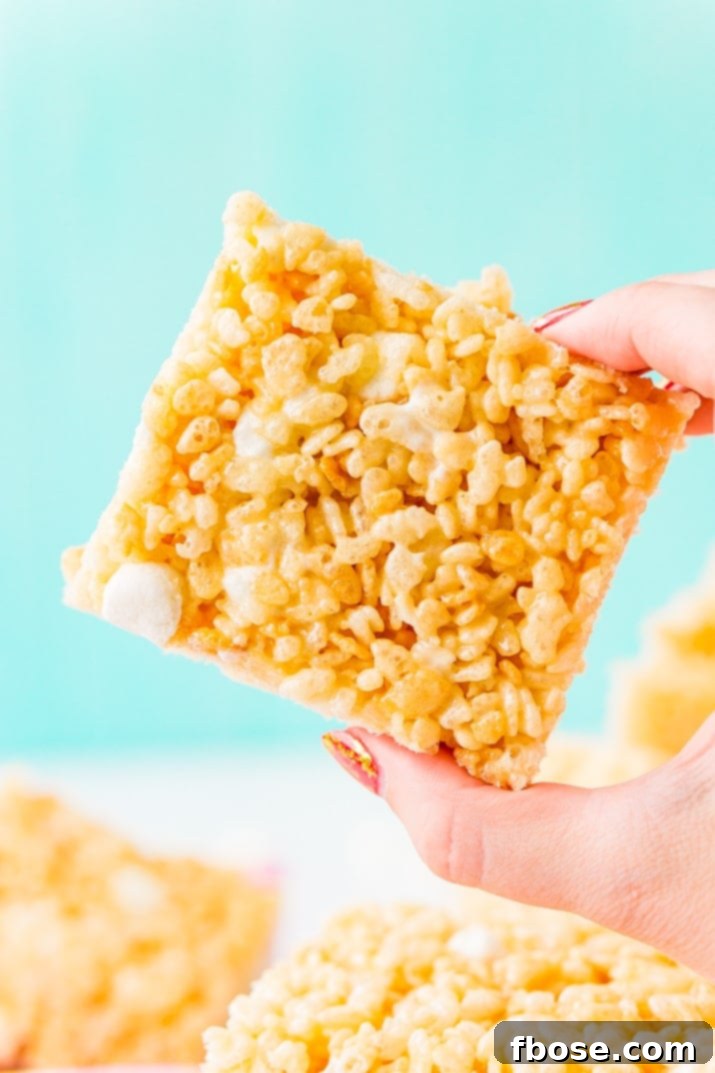 Sweet Crispy Mallow Squares 5 Chewy Rice Krispies Treats recipe with salty butter, sweet marshmallow, and crunchy cereal, an easy no-bake dessert ready in under 30 minutes.