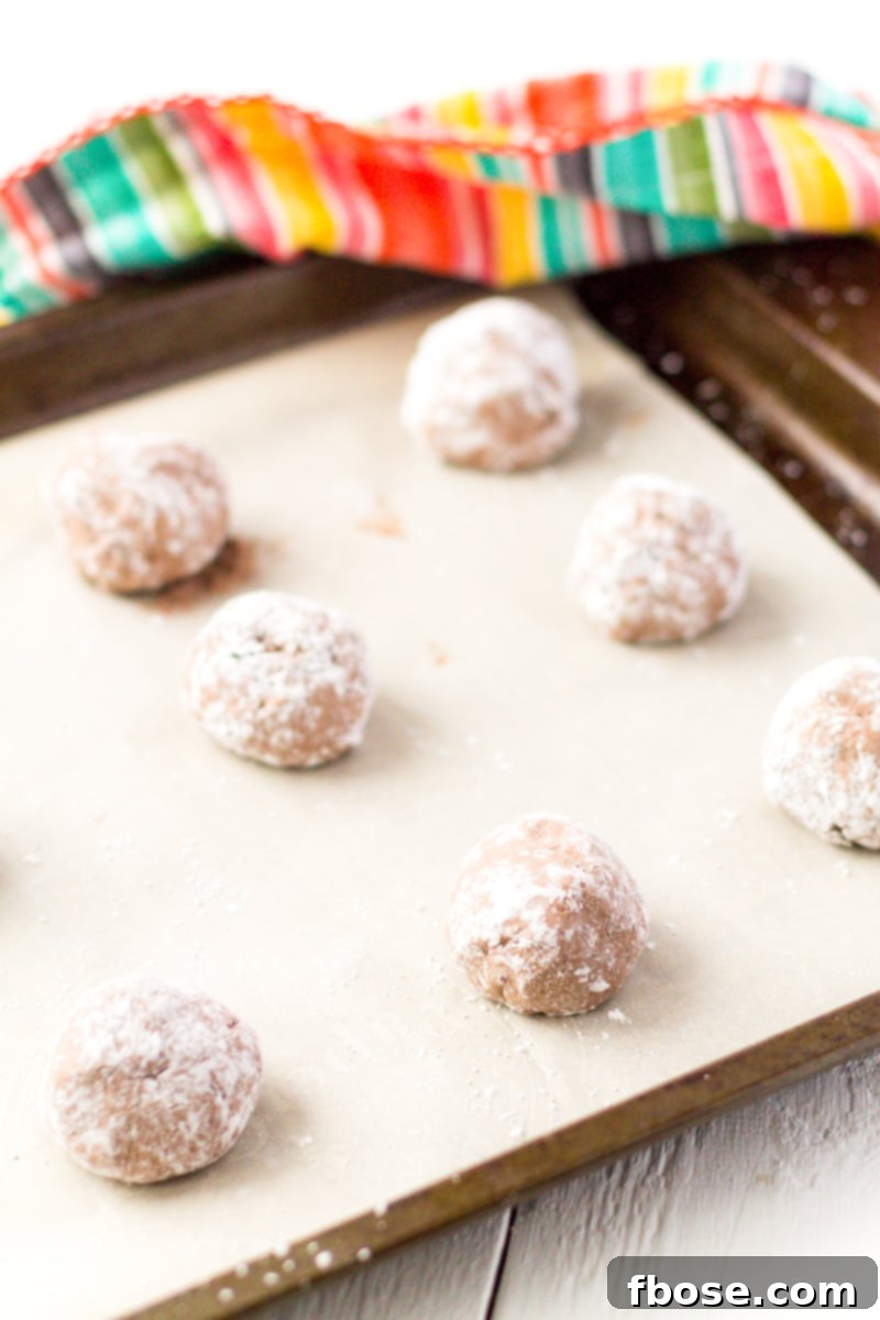 Freshly baked Cool Whip Cookies cooling on a wire rack.