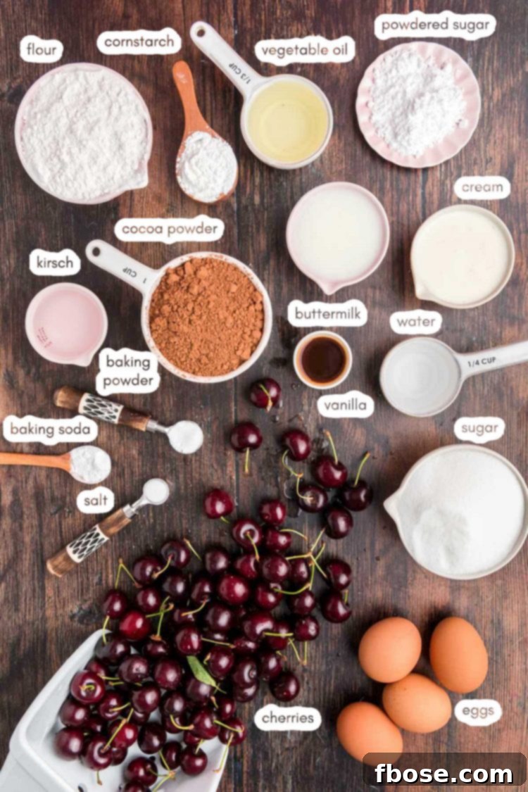 Overhead photo of ingredients to make black forest cake prepped on a wooden counter.
