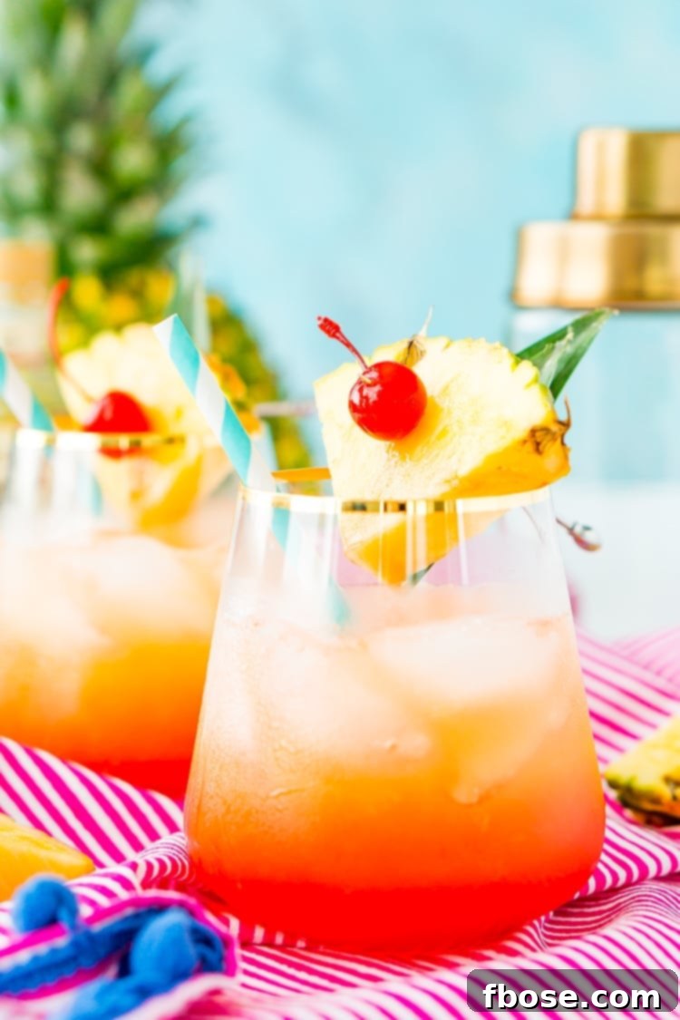 Several Mai Tai cocktails with various tropical garnishes, including paper umbrellas and fruit slices, ready for a party.