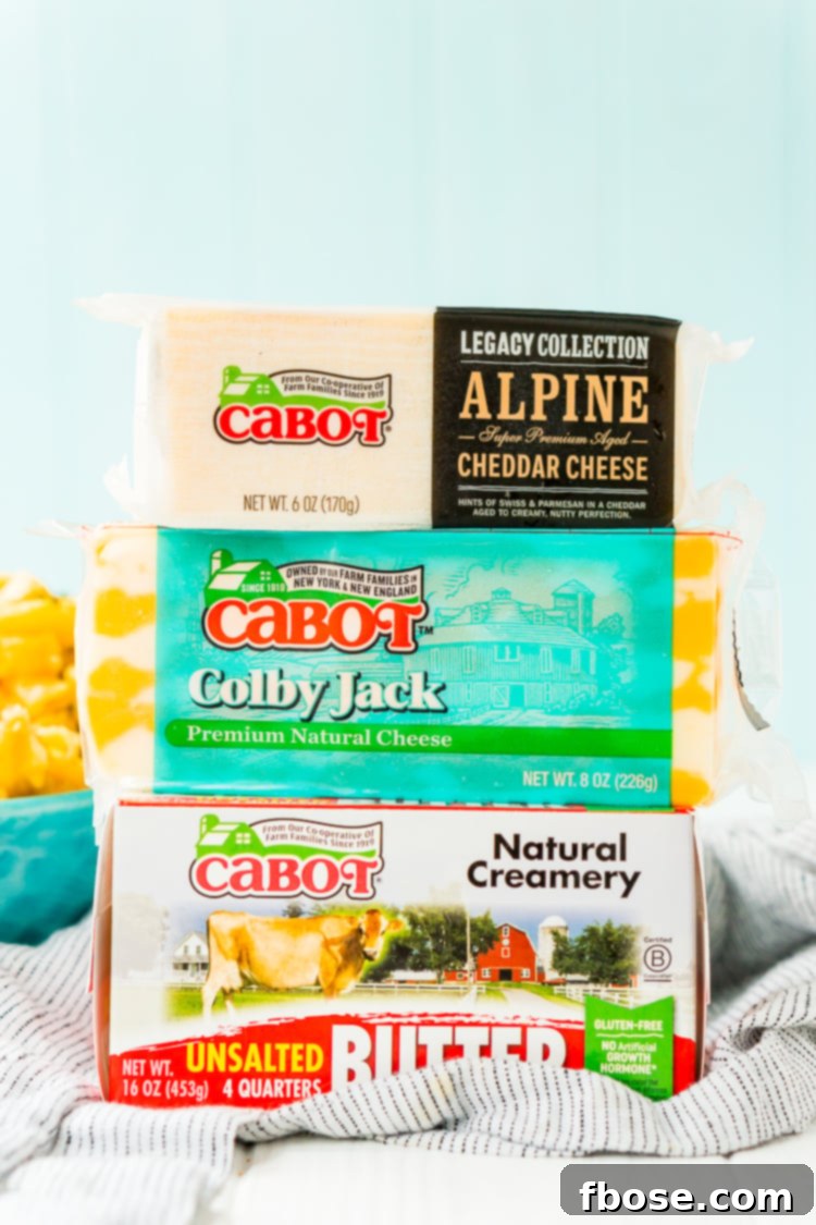This Crock Pot Mac and Cheese is an easy and delicious dinner loaded with cheddar and Colby Jack cheeses and perfect for a weeknight meal or cozy weekend dinner!