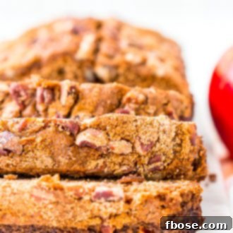 Delightful homemade Applesauce Bread, perfectly moist and spiced, featuring brown sugar and pecans - ideal for fall baking and sharing.