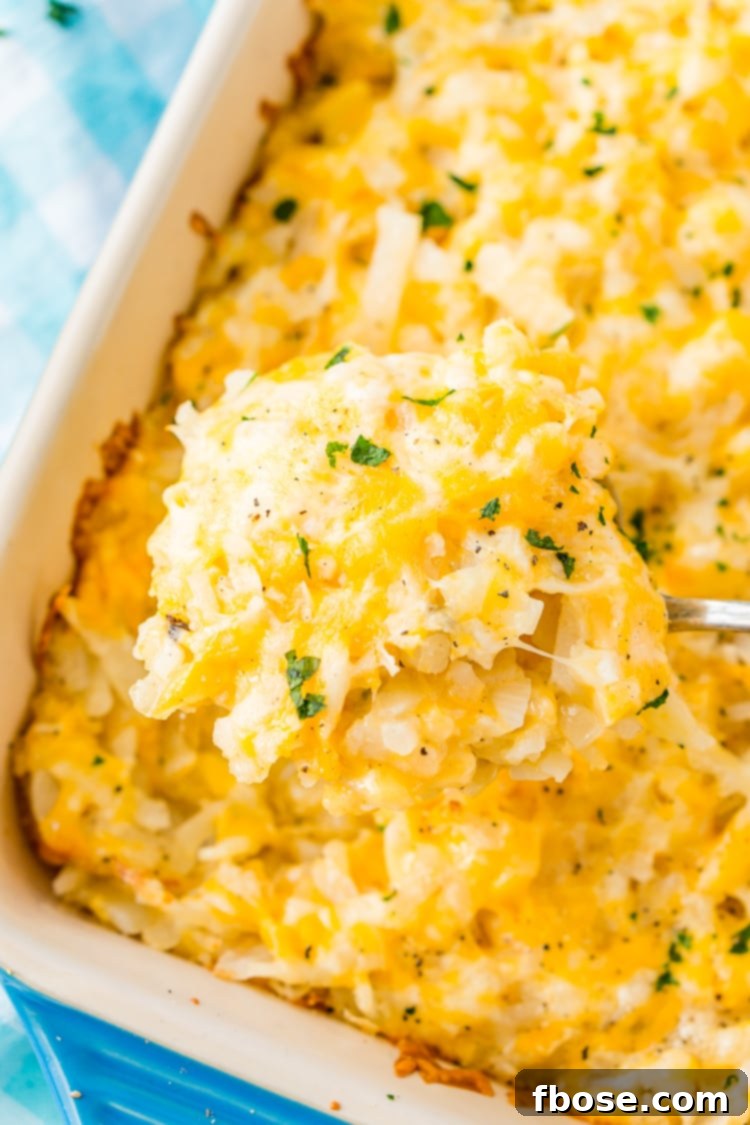 Overhead shot of warm Hashbrown Casserole, freshly baked and ready for breakfast or brunch.