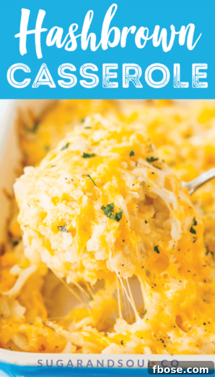 Hashbrown Casserole garnished with fresh chives, presented beautifully in a rustic setting.