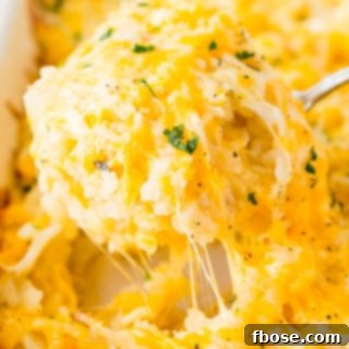 A close-up view of the golden and cheesy Hashbrown Casserole, a perfect comfort food.
