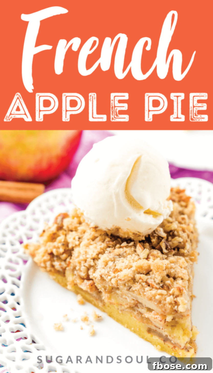 A beautifully plated slice of Impossible French Apple Pie with a scoop of vanilla ice cream, ready to be served.