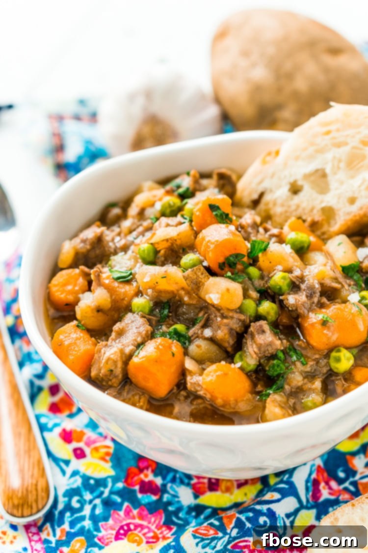 Tender Slow-Cooked Beef Stew 5 A vibrant mix of fresh carrots, potatoes, celery, and peas, ready to be added to the Crock Pot Beef Stew.