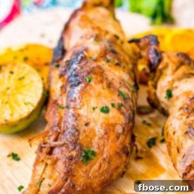 Cuban Mojo Pork Tenderloin, a delicious and easy recipe with fresh orange, lime, garlic, and cilantro.