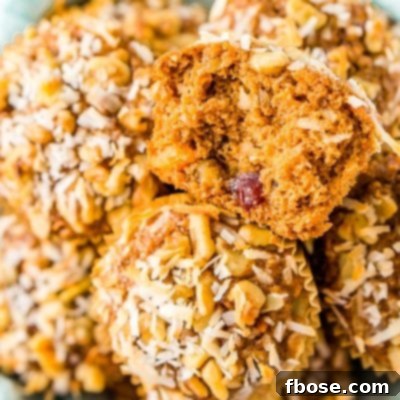 Morning Glory Muffins are a wholesome breakfast or snack recipe made with whole wheat flour and loaded with craisins, carrots, apple butter, walnuts, and more!