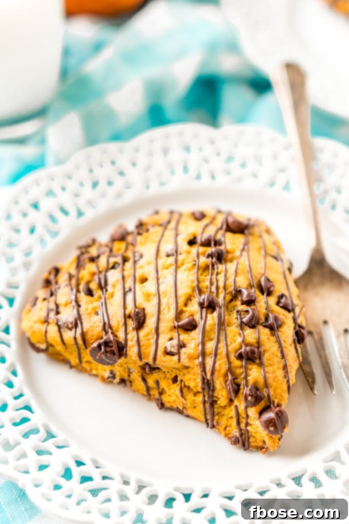 Best Ever Pumpkin Scones recipe featuring a blend of dark and semi-sweet chocolate, offering a delightful twist on a classic fall pastry.