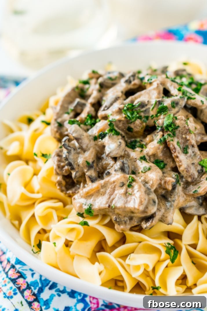 Beef Stroganoff is a delicious dinner recipe made with tender ribeye steak sautéed in a buttery mushroom and sour cream sauce and served over egg noodles.