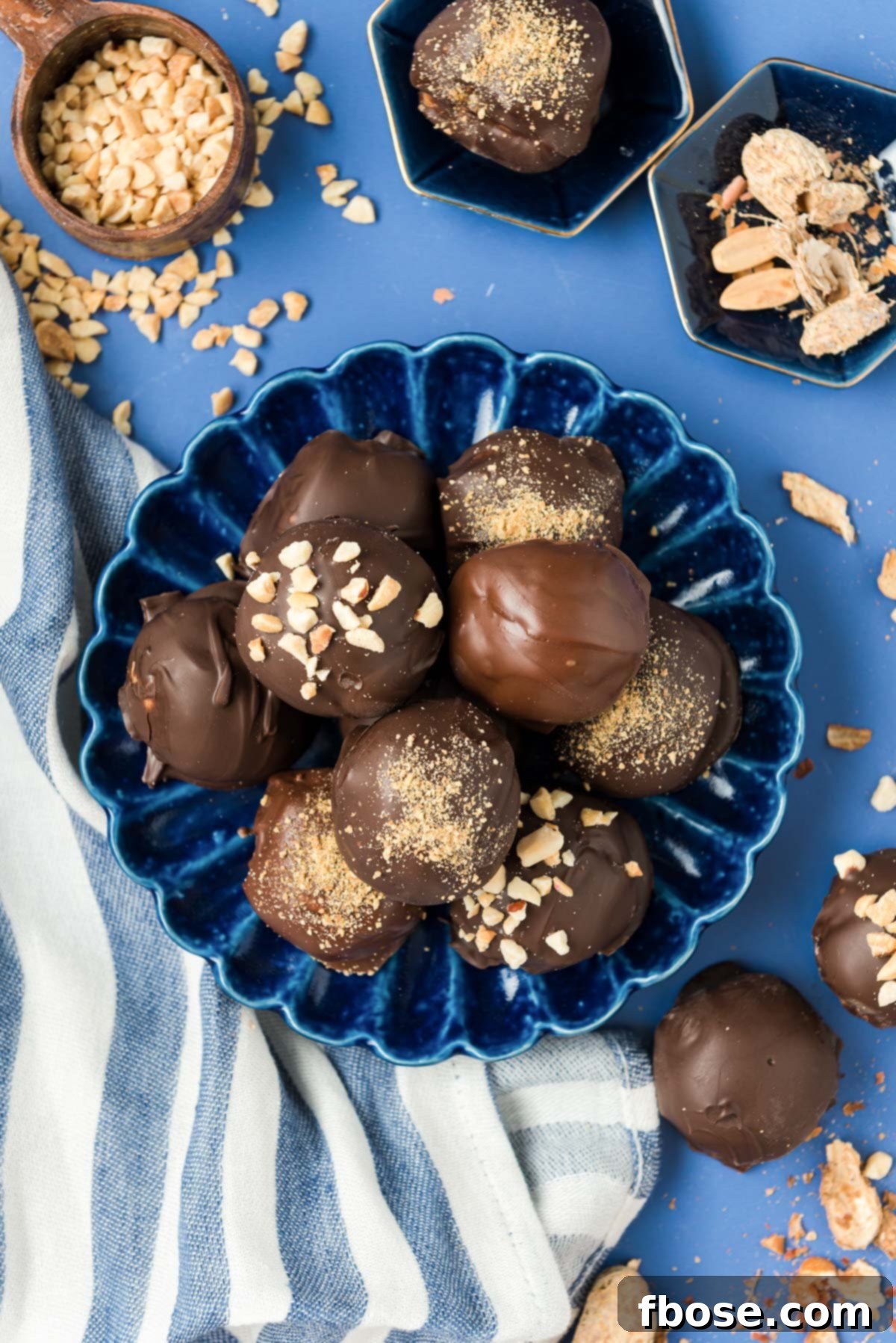 Chilled Peanut Butter Bliss Balls 3 Overhead photo of a blue plate with peanut butter balls on it.