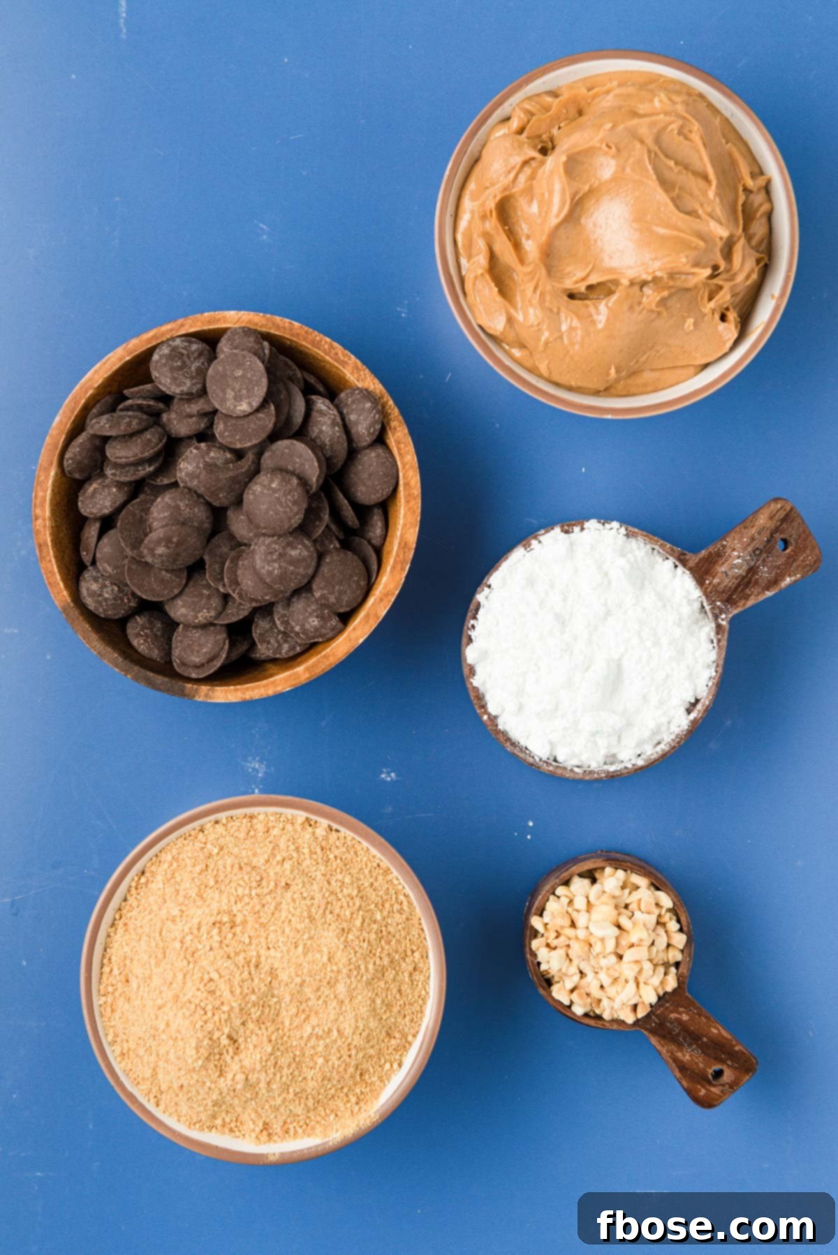 Chilled Peanut Butter Bliss Balls 4 Overhead photo of ingredients to make peanut butter balls on a blue surface.