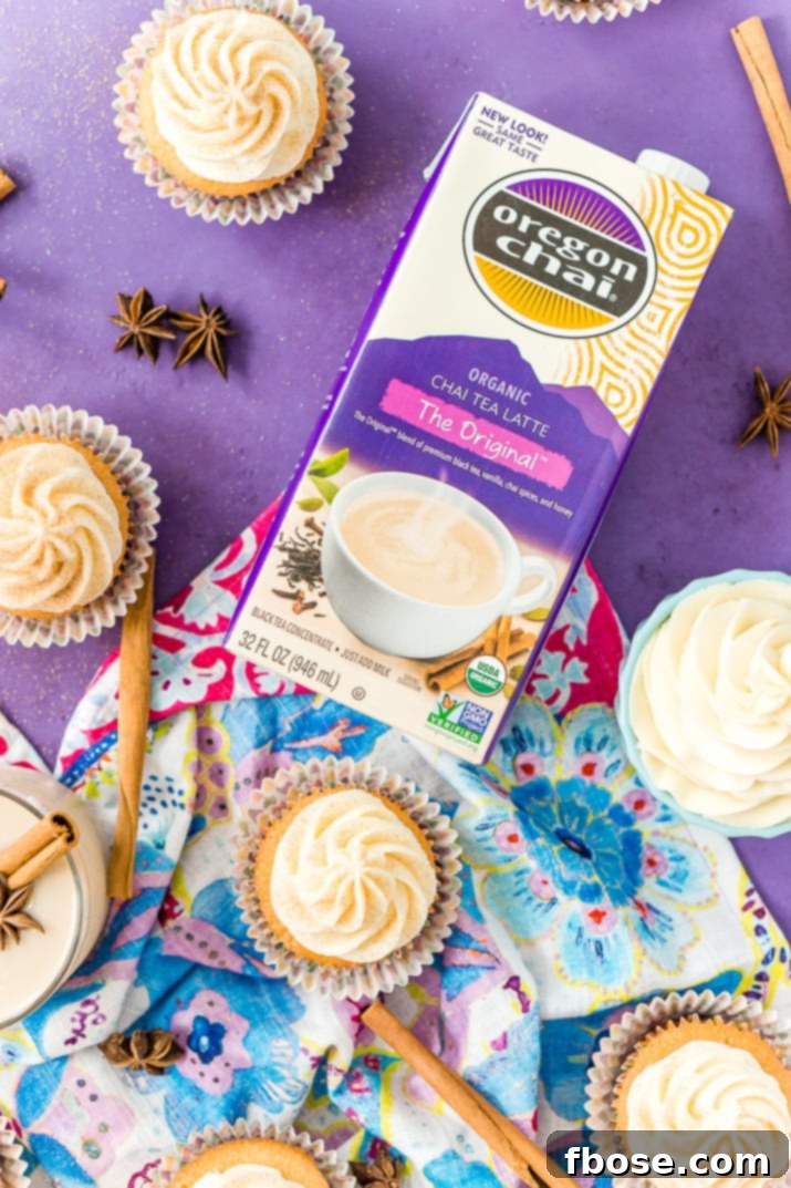 Spiced Chai Cupcakes 4 A trio of delicious Chai Cupcakes with Vanilla Frosting, showcasing their inviting appearance and rich, spiced flavors. These treats are ideal for a mindful break during autumn's rush.
