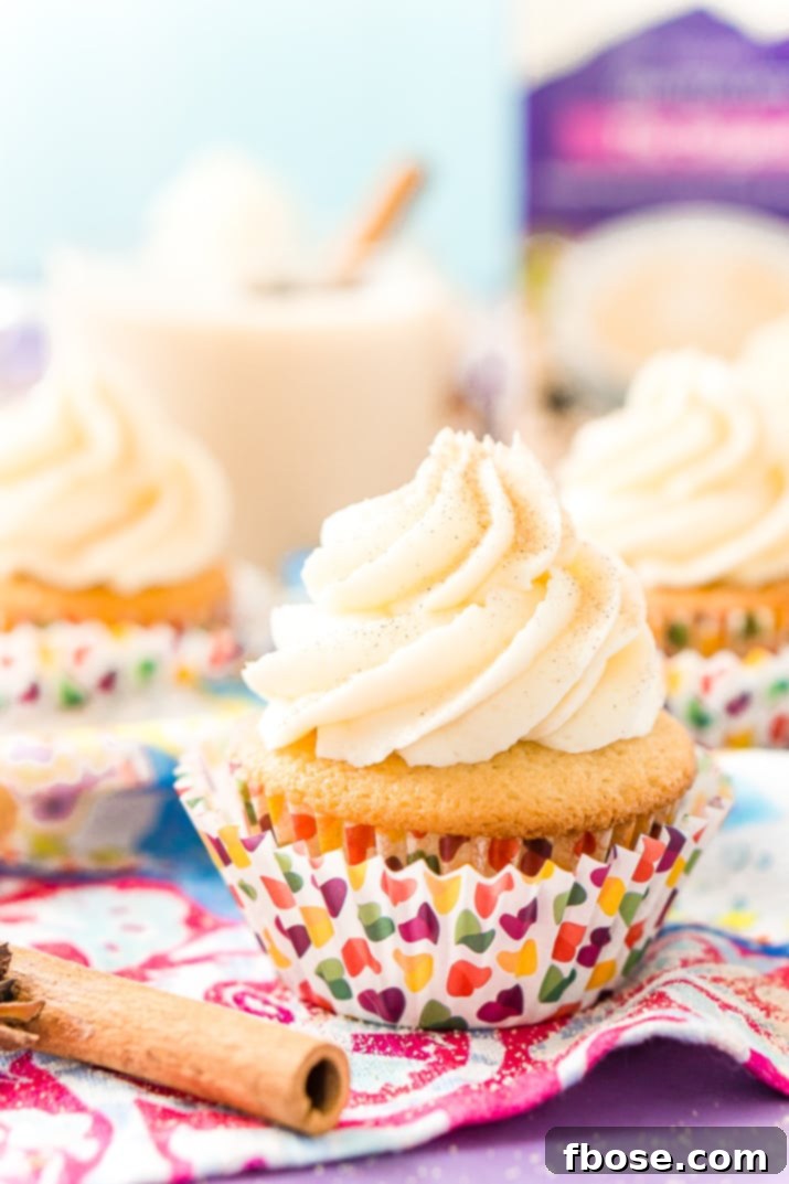Spiced Chai Cupcakes 5 Six Chai Cupcakes with Vanilla Frosting, beautifully arranged and ready to be enjoyed. These spiced treats offer a delightful pause in any busy schedule.