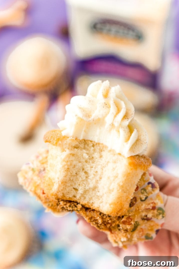 Spiced Chai Cupcakes 6 A close-up of a Chai Cupcake with Vanilla Frosting, highlighting the fluffy texture and perfect spice blend. A perfect pick-me-up for fall.