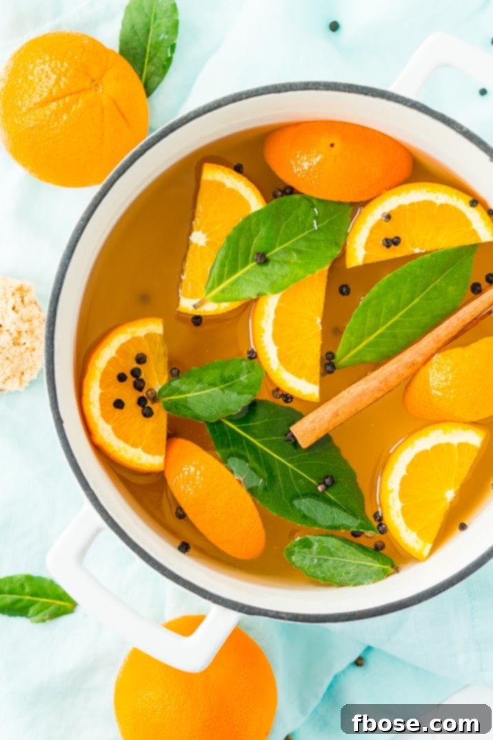 This Turkey Brine recipe made with salt, oranges, bay leaves, cinnamon, brown sugar, and black pepper will add moisture, tenderness, and flavor to your turkey. Brine turkey for 12 to 24 hours for the most amazing turkey for your holiday gathering!