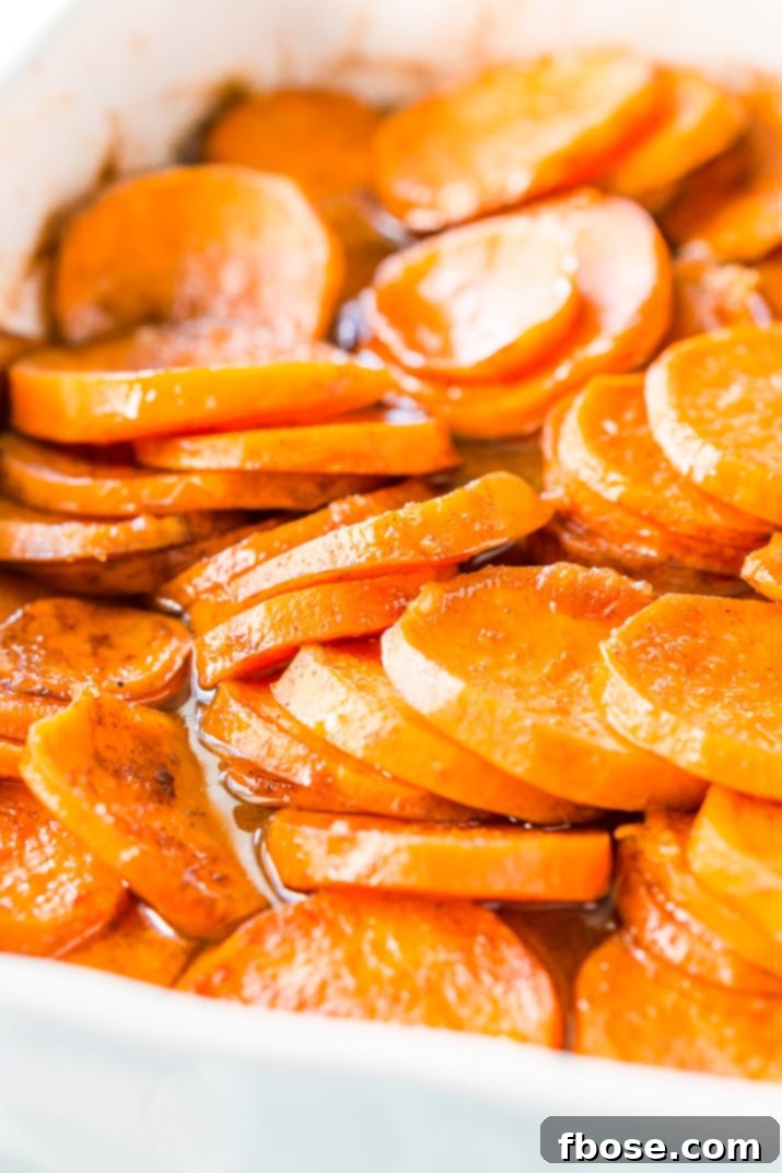 Candied Yams are a classic Thanksgiving side dish made from yams/garnet sweet potatoes and loaded with butter, sugar, honey, and spices.