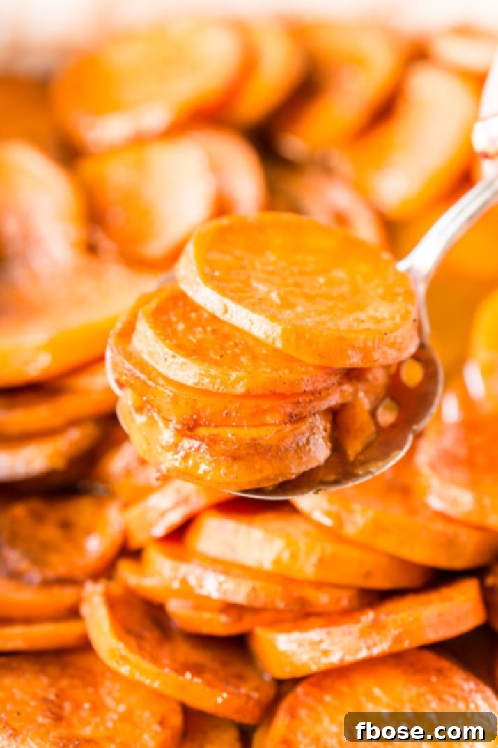 Candied Yams are a classic Thanksgiving side dish made from yams/garnet sweet potatoes and loaded with butter, sugar, honey, and spices.