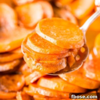 Candied Yams are a classic Thanksgiving side dish made from yams/garnet sweet potatoes and loaded with butter, sugar, honey, and spices.