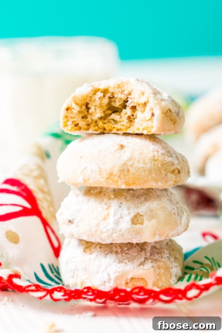 Snowball Cookies are a classic and a staple at holiday cookie exchanges. Made with butter, flour, sugar, vanilla, and chopped pecans, they're a delicious and addictive dessert!