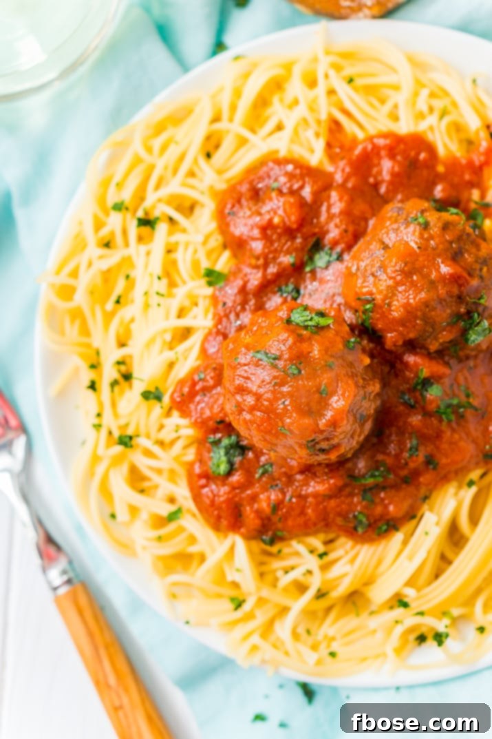 Mix up these Easy Crockpot Meatballs in the morning and stick ‘em in the slow cooker while you continue your day. The result is tender, mouthwatering Italian Meatballs drenched in your favorite pasta sauce.