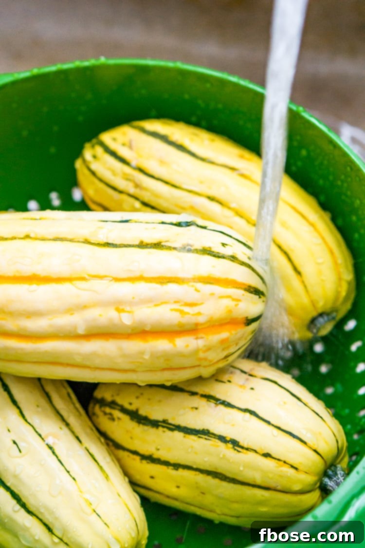 Sweet Roasted Delicata Squash 4 Halved delicata squash with seeds scooped out, showing the smooth interior.