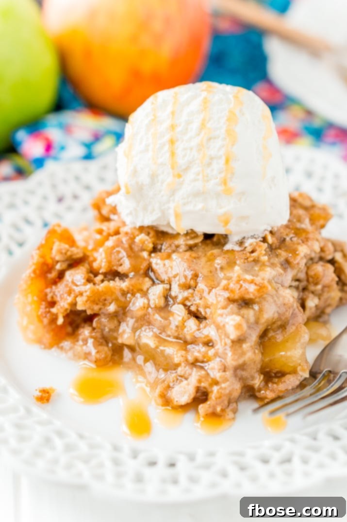 Apple Dump Cake is a 4-ingredient recipe that results in a delicious fall dessert somewhere between apple cake and apple crisp!