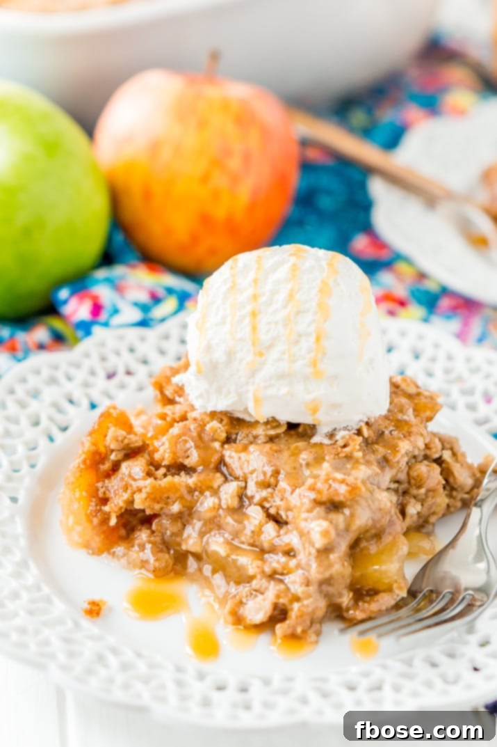 Apple Dump Cake is a 4-ingredient recipe that results in a delicious fall dessert somewhere between apple cake and apple crisp!