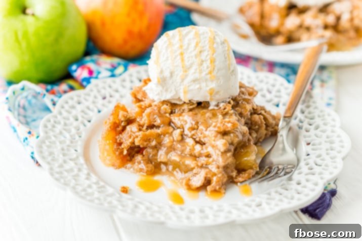 Apple Dump Cake is a 4-ingredient recipe that results in a delicious fall dessert somewhere between apple cake and apple crisp!