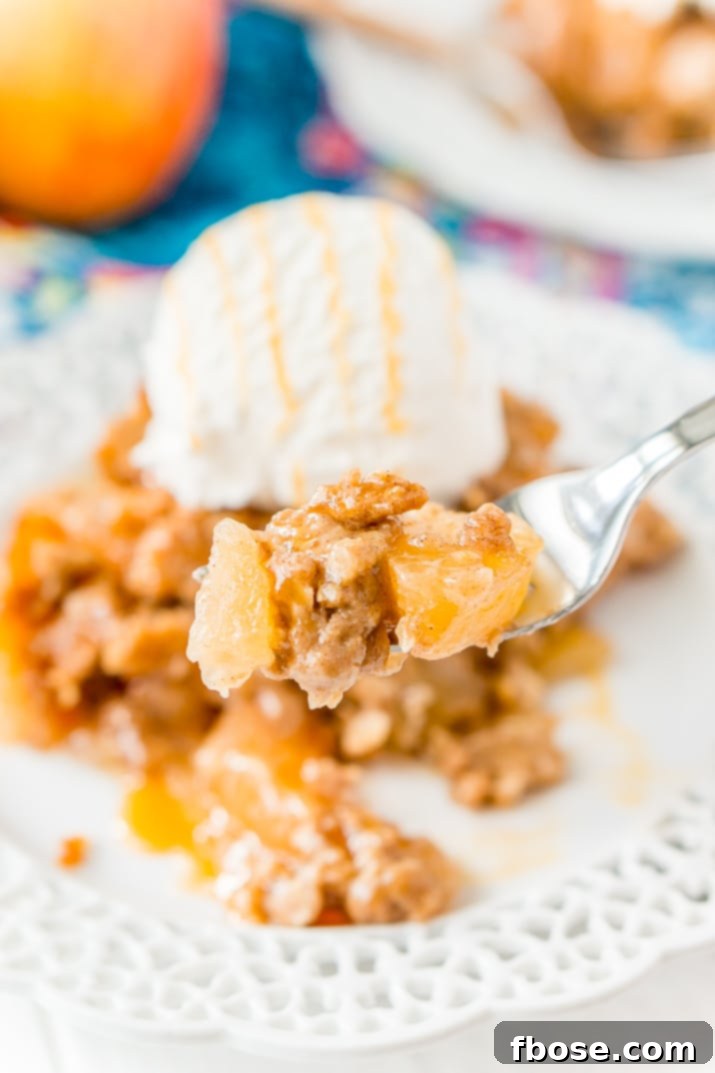 Apple Dump Cake is a 4-ingredient recipe that results in a delicious fall dessert somewhere between apple cake and apple crisp!