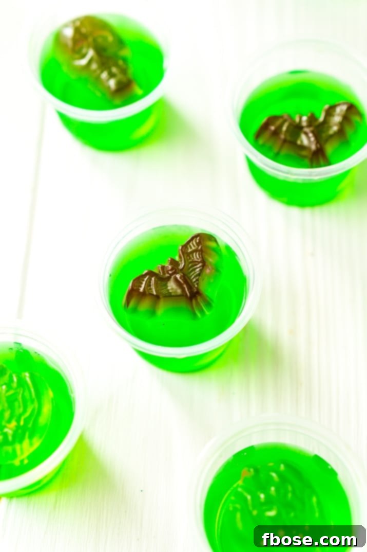 Ghoulish Gelatin Shooters 4 These Halloween Jello Shots are super easy to whip up and will make a fun addition to your Halloween Party!