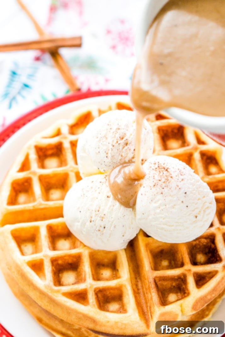 A close-up of Spiced Vanilla Syrup, showcasing its invitingly smooth and thick texture, ready to be poured generously over breakfast favorites. Hints of cinnamon and vanilla are visible.
