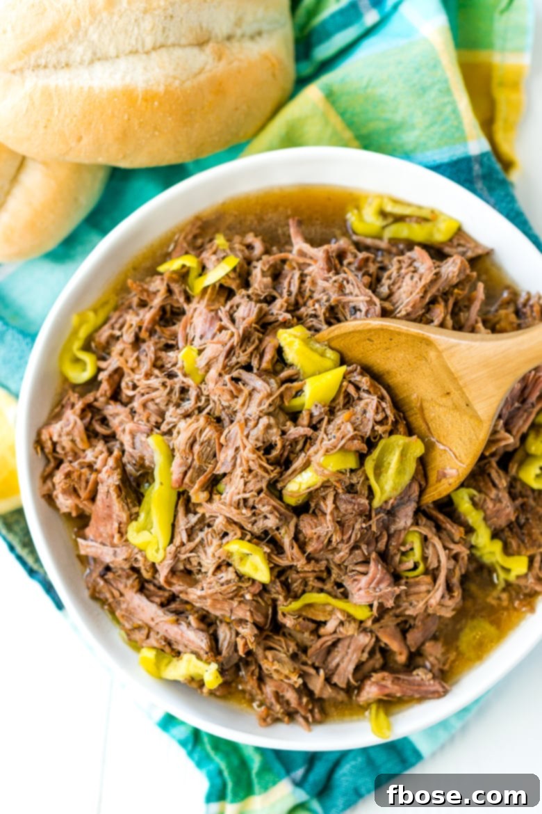 This Slow Cooker Italian Beef is an easy dinner recipe inspired by the Chicago staple that has so much flavor it will literally melt in your mouth!