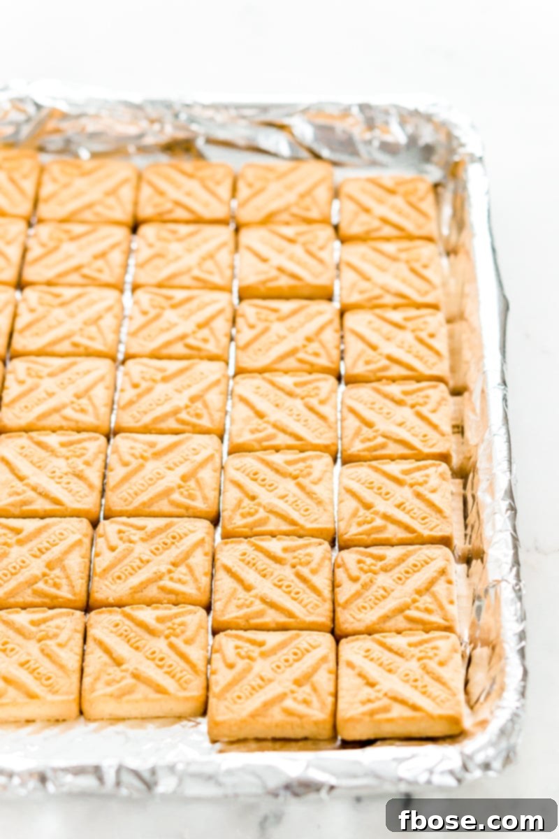 Shortbread cookies on a foil lined pan.
