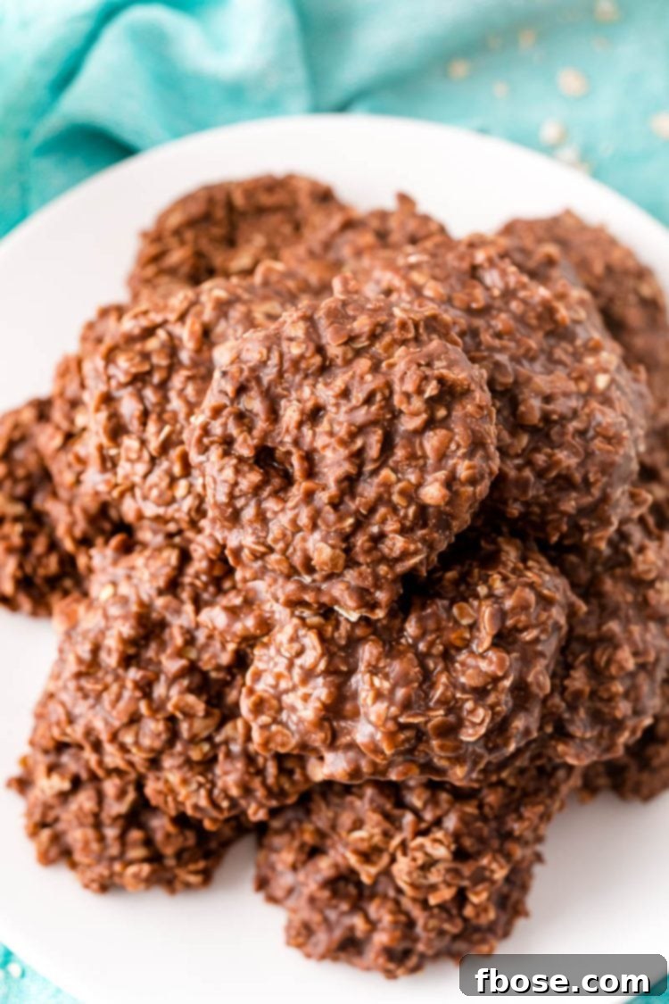No bake cookies on a white plate on a blue napkin.