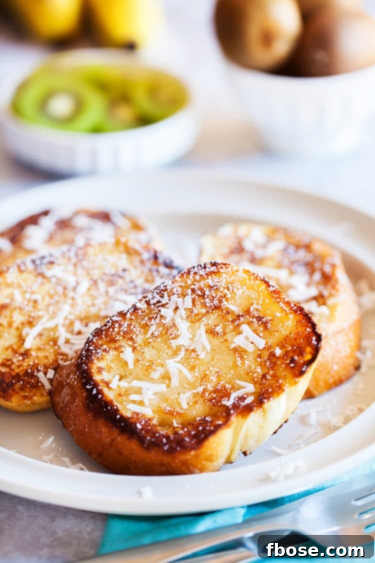 Coconut Dream Toast 2 Delicious Coconut French Toast with homemade creamy coconut syrup, perfect for an easy and exotic breakfast