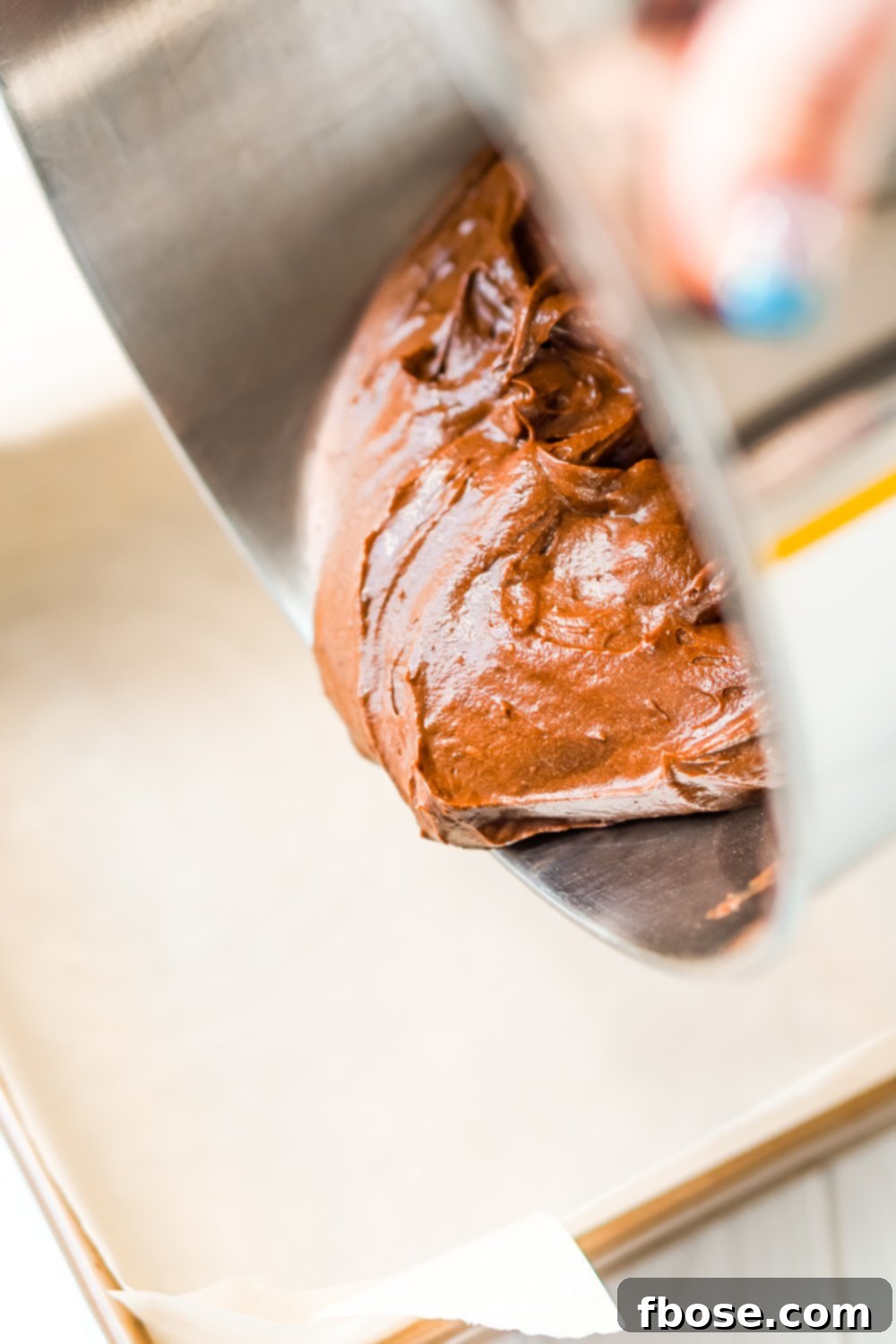 Twix Caramel Fudge Brownies 5 Brownie batter being poured into a baking pan