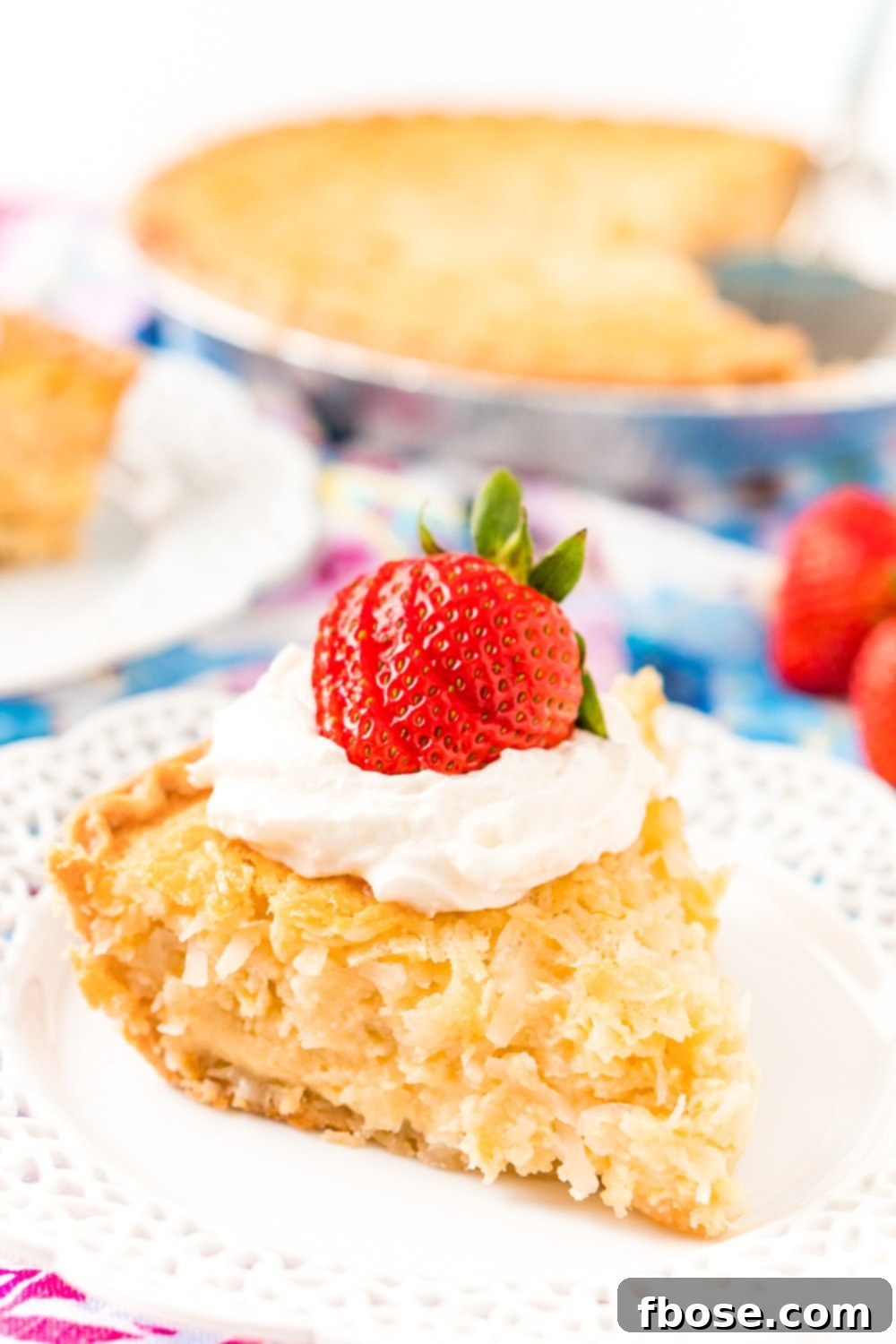 Coconut Custard Pie is a dense and creamy treat made with just 7 ingredients including coconut, milk, and eggs! It’s super simple to whip up for any gathering this spring, especially for Easter dessert!