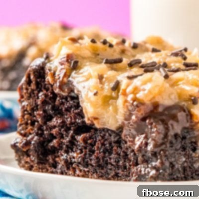 This German Chocolate Poke Cake takes the classic dessert recipe to a whole new level with a tender chocolate cake soaked in sweetened condensed milk and topped with a rich chocolate ganache and sweet coconut pecan frosting!