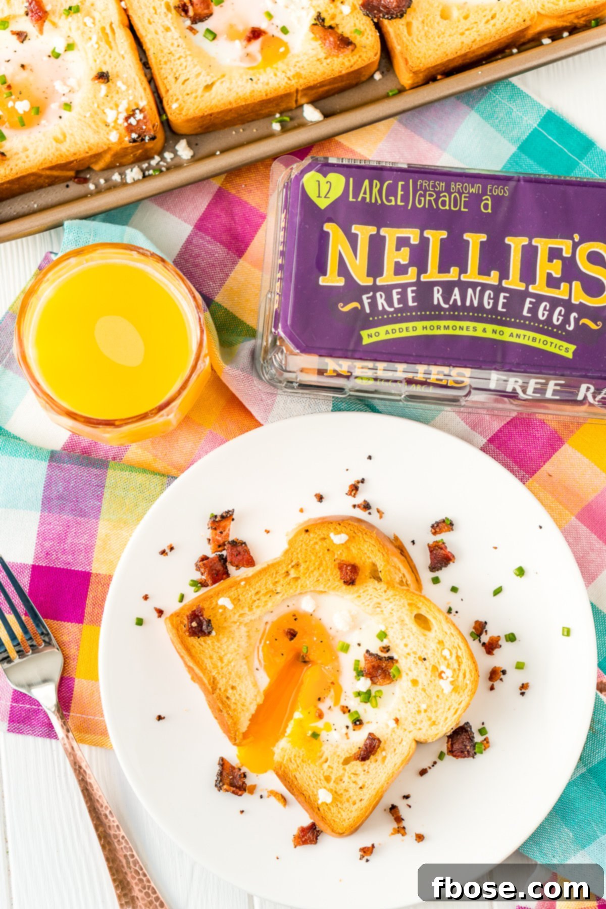 Delicious Sheet Pan Egg in a Hole served with a variety of fresh toppings.