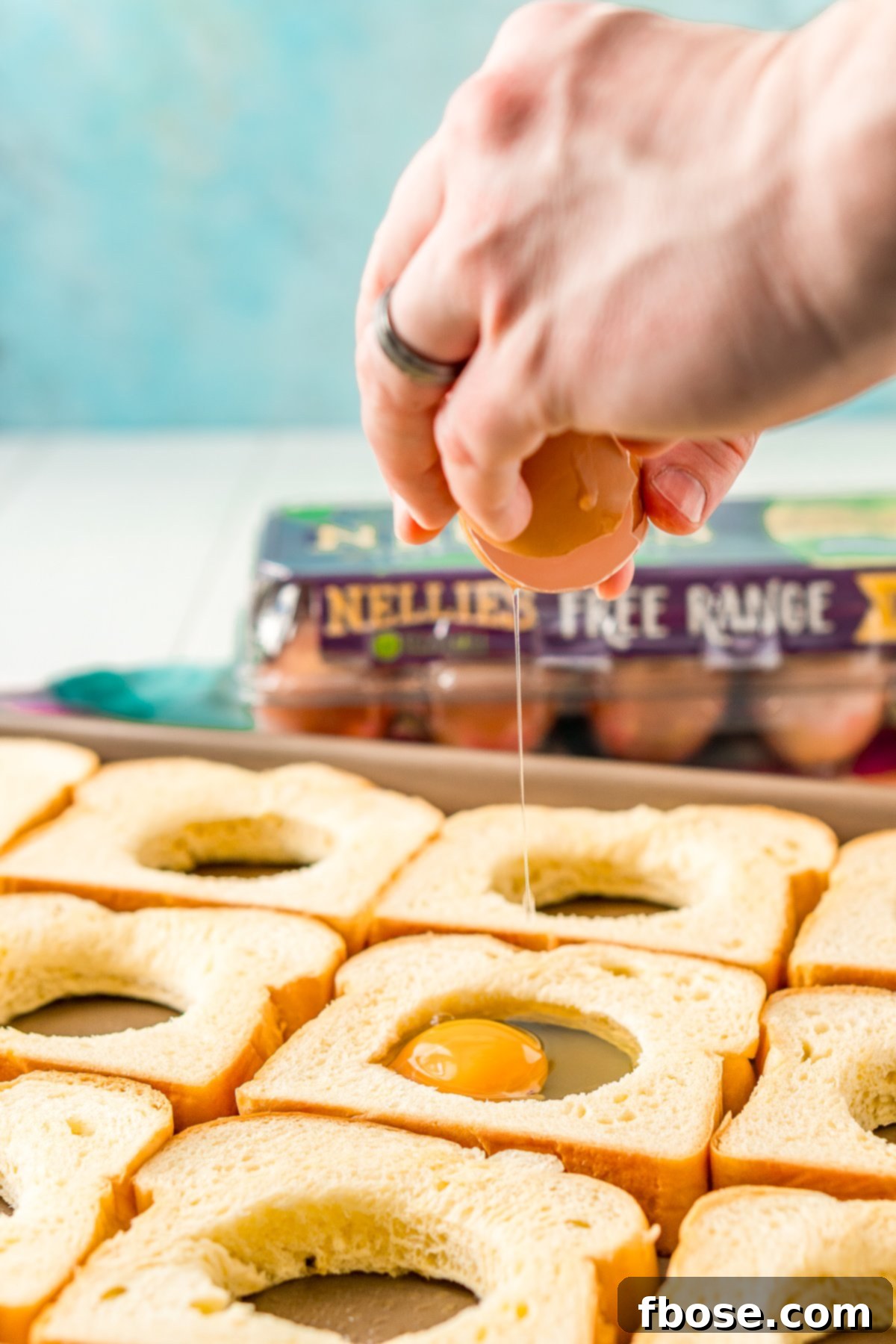 Fresh Nellie's Free Range eggs on a sheet pan, ready for making egg in a hole.