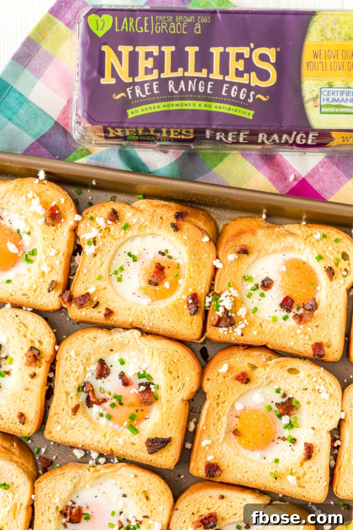 A vibrant topping bar for Sheet Pan Egg in a Hole, featuring various ingredients.