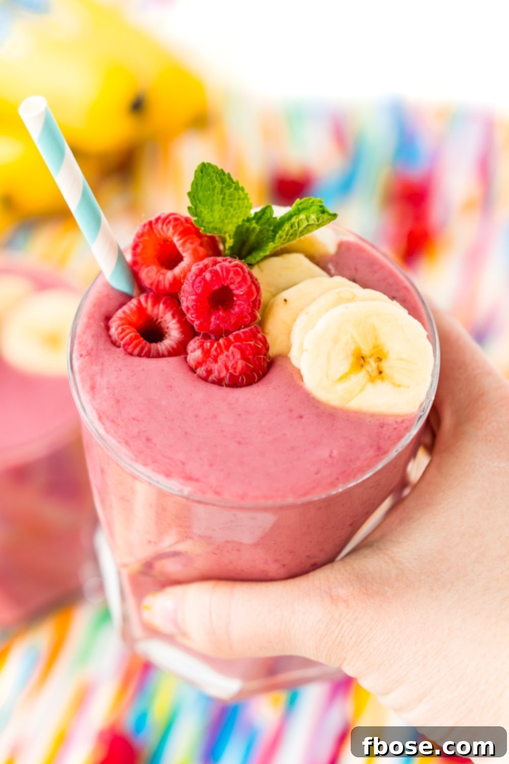 Berry Banana Bliss 6 This Raspberry Banana Smoothie is a simple and delicious 5-ingredient drink recipe made with raspberries, bananas, oat milk, yogurt, and honey. A delicious snack or breakfast!