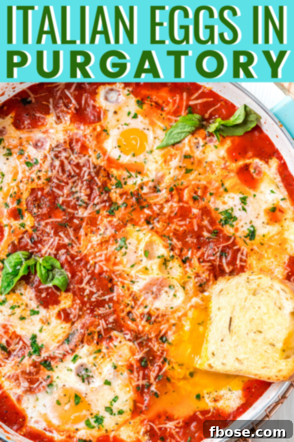 Italian Poached Eggs in a skillet, garnished with fresh basil and parmesan cheese. A beautifully styled image of Eggs in Purgatory, serving as a visual guide and inspiration for the recipe.