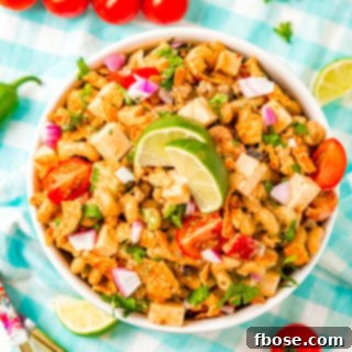 Overhead photo of a bowl of taco pasta salad, showcasing its vibrant ingredients and inviting presentation.