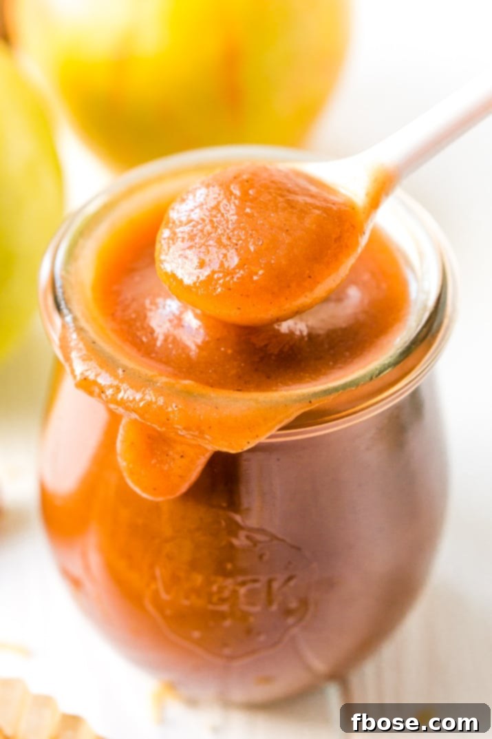 Homemade Crockpot Apple Butter: a rich, spiced apple spread perfect for fall, made easily in a slow cooker with fresh apples, sugar, and warm spices.