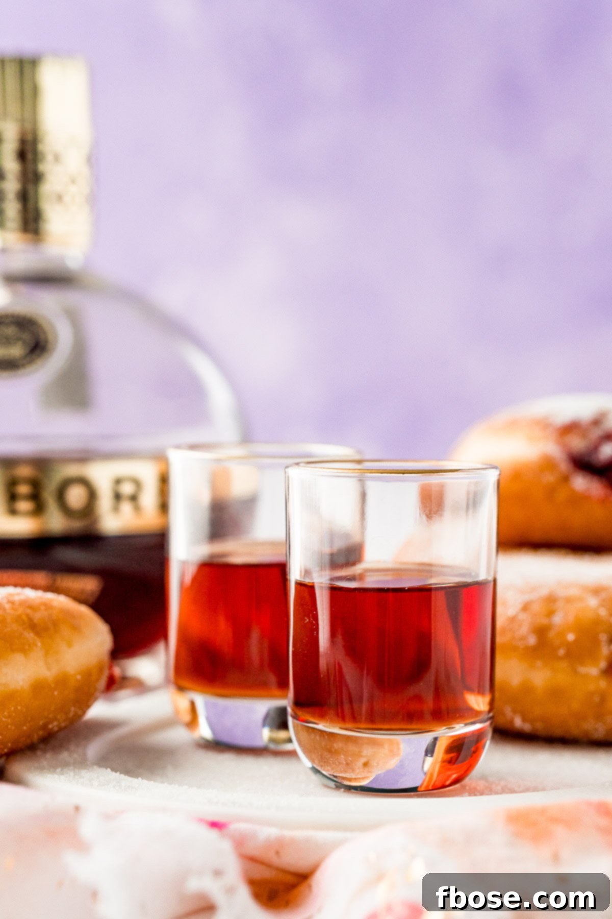 Glazed Jam Shot 3 Chambord poured into shot glasses.