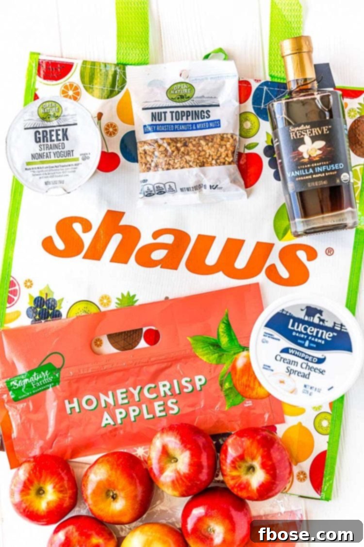 Overhead photo showcasing a Shaw's reusable shopping bag filled with fresh ingredients needed for apple slices with cream cheese yogurt frosting, highlighting convenience and quality.